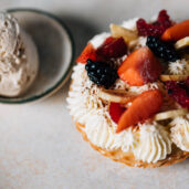Delectable berry and cream tart with ice cream at luxury hotel restaurant.